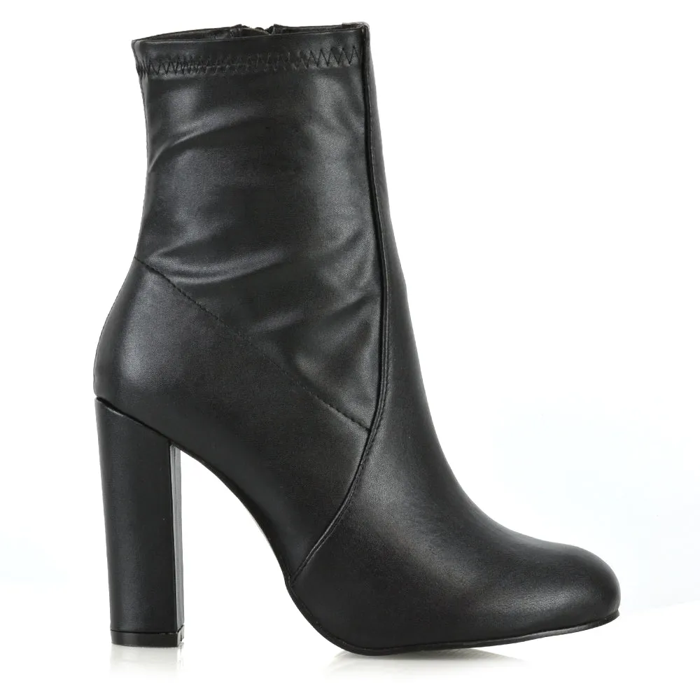 Margot Block High Heeled Zip-up Sock Ankle Boots in Black Synthetic Leather