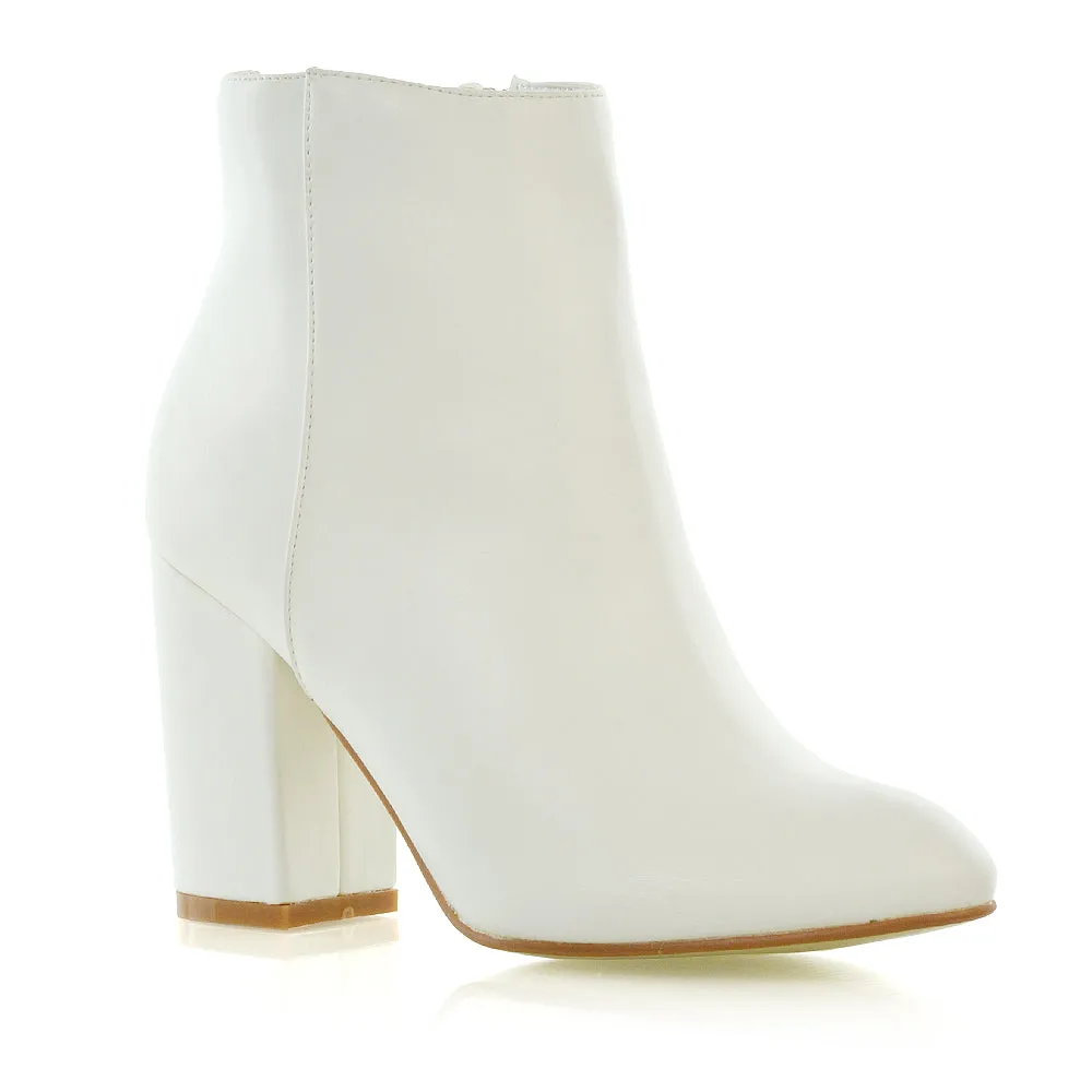 PEACHES CHUNKY BLOCK HIGH HEEL ZIP UP ANKLE WINTER BOOTS IN WHITE SYNTHETIC LEATHER